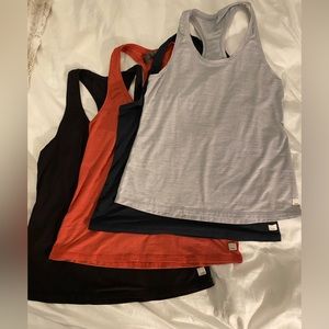 Vuori Lux performance tank top bundle of 4 size Large